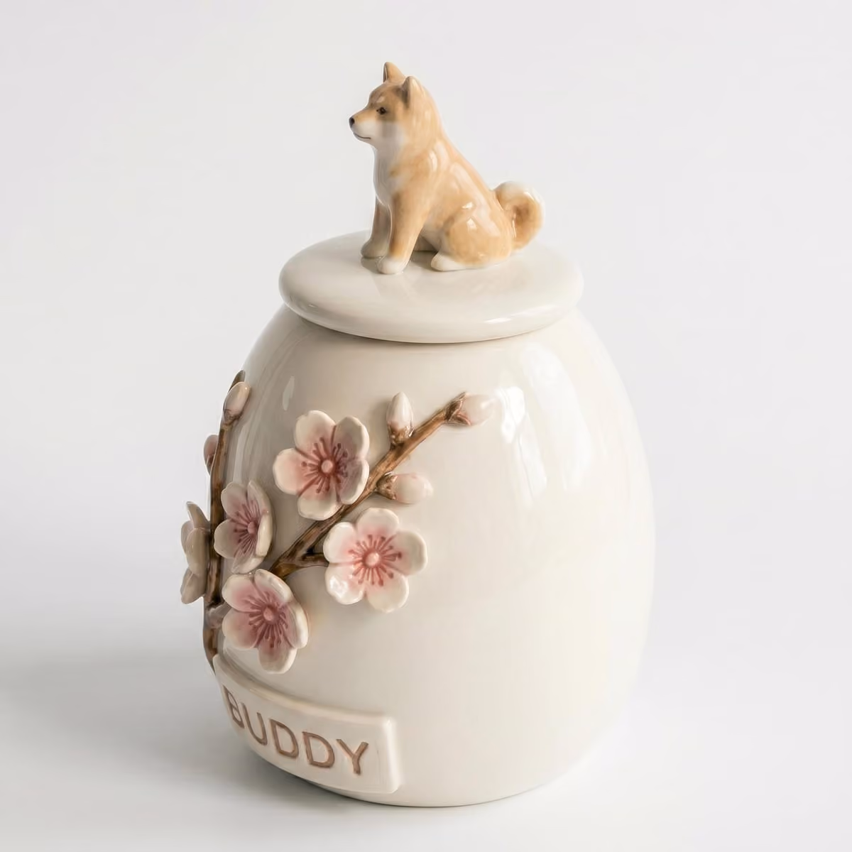 Cherry Blossom urn lid with the sculpted pet figurine