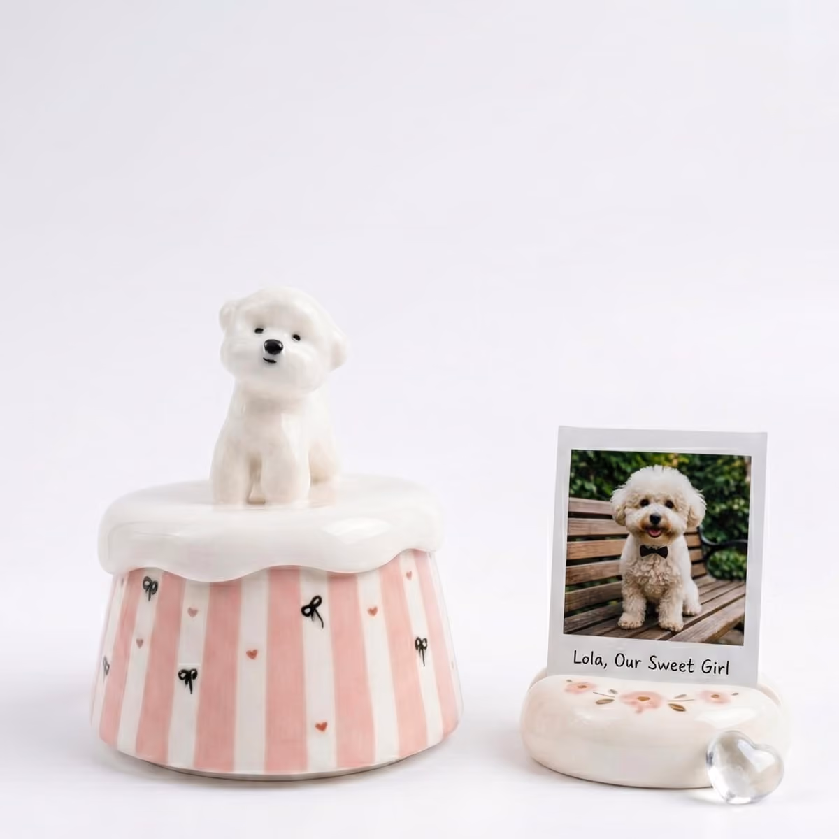Three handmade ceramic pet urns in small, medium and large sizes side by side