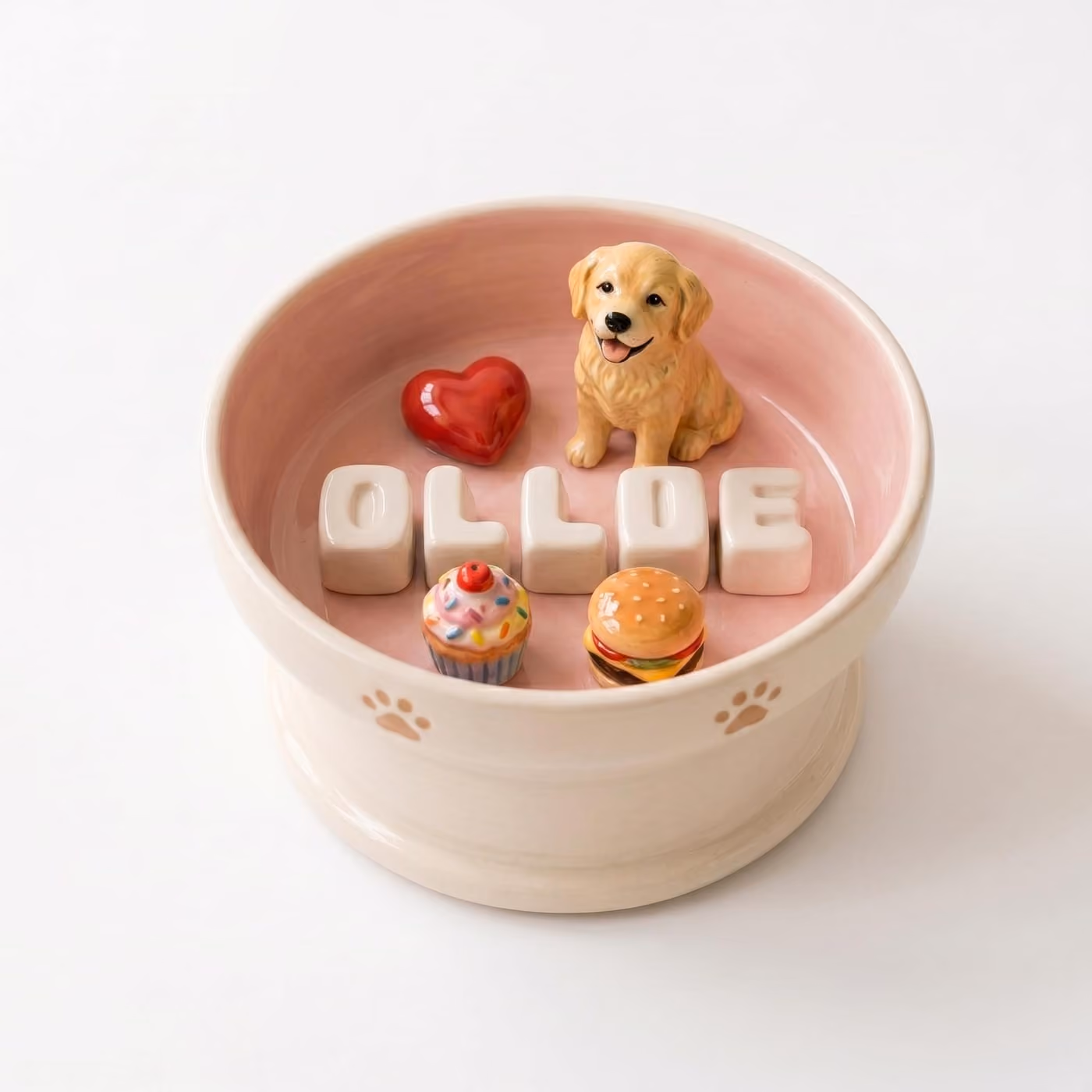 Handmade ceramic pet bowl with a hand-sculpted pet figurine