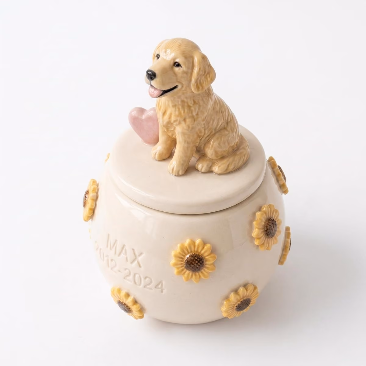 Close-up of the sunflower detail on a handmade ceramic urn